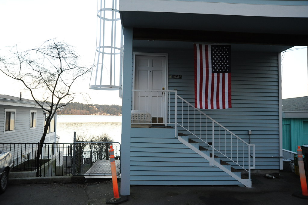 An American home flying the U.S. flag